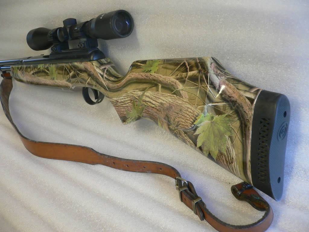 Real camo dipped rifle Real camo dipped rifle