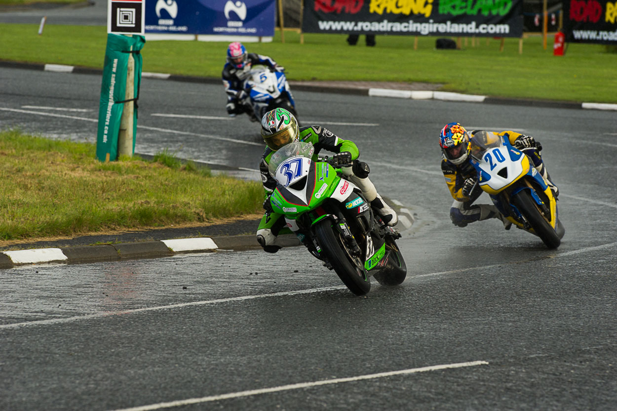 James Hillier (600 Quattro Plant Kawasaki) exits the Magic Roundabout at the International North West 200 Carbon fibre dipping for Kawasaki