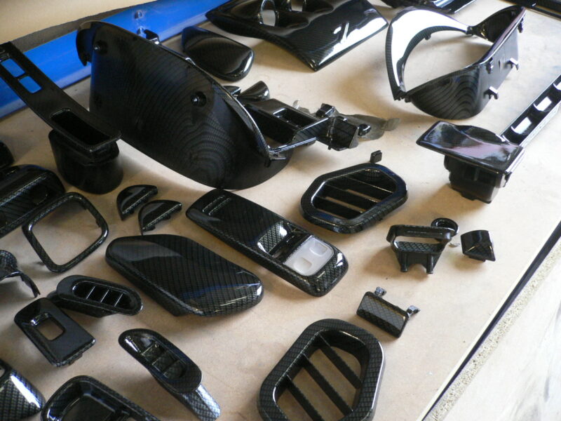 Good shot of Nissan 300zx interior parts carbon dipping. Done by hydrographcis team at Wicked Coatings in Poole