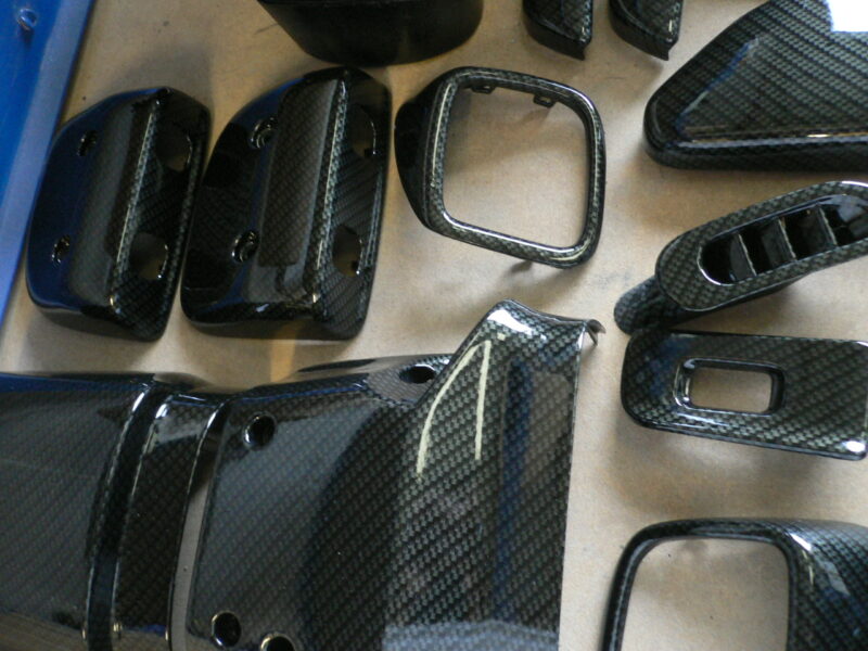 Nissan dash parts in carbon dip