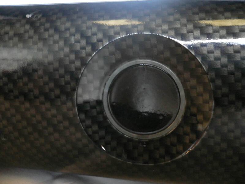 close up carbon dipping on xbox 360 case