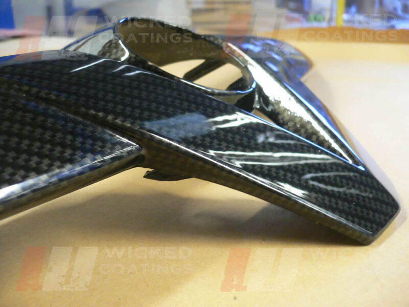Close up of vauxhal grill trim - carbon dipping
