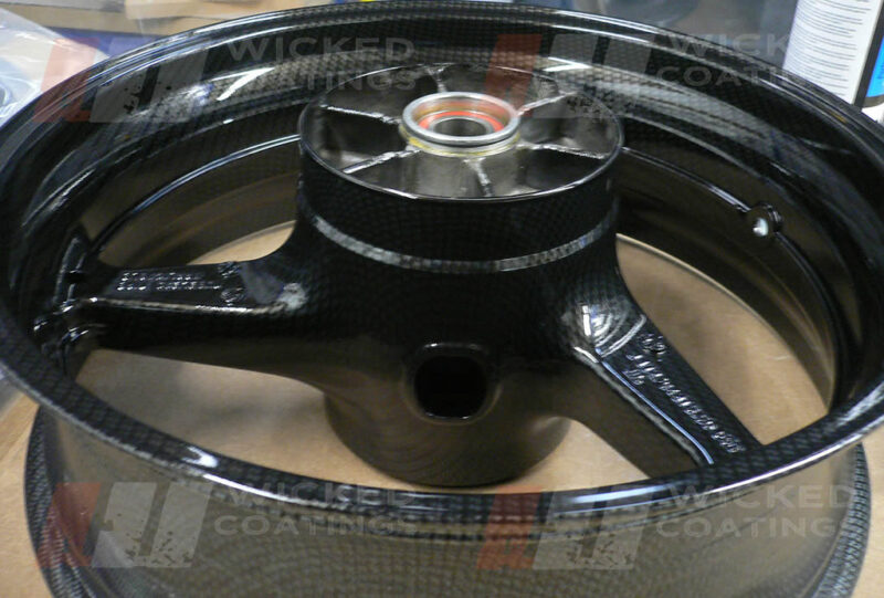 carbon dipping on Honda CBR 600 motorcycle rear wheel