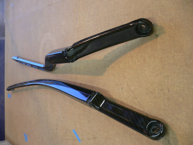 Carbon dipping on wiper arms