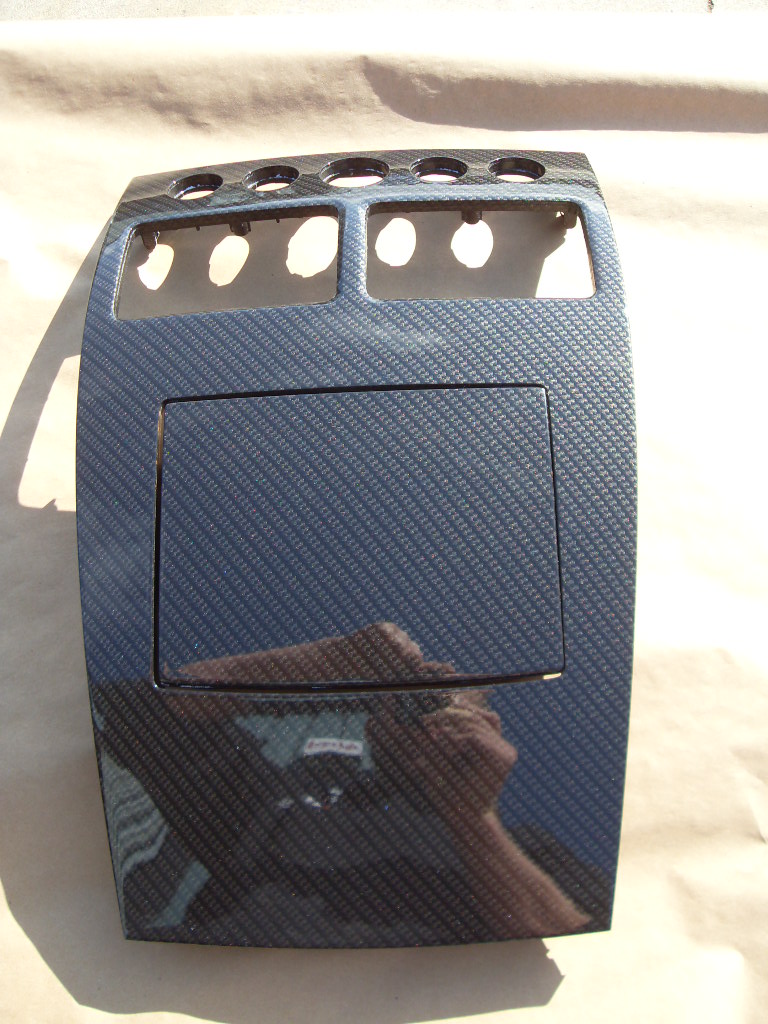carbon dipped aston martin centre console
