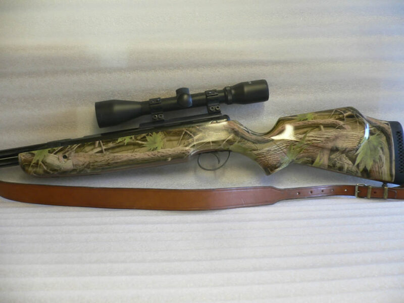 Real camo dipped rifle