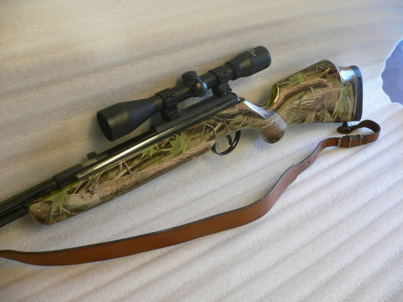 Real camo dipped rifle
