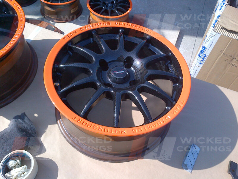 Carbon wheels with orange painted rims