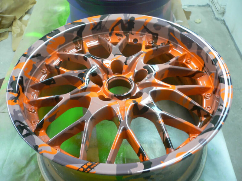 Lady camo (morning wood) dipped over an orange base colour