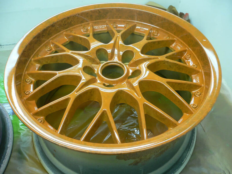 Walnut dipped alloy wheel with orange candy laquer