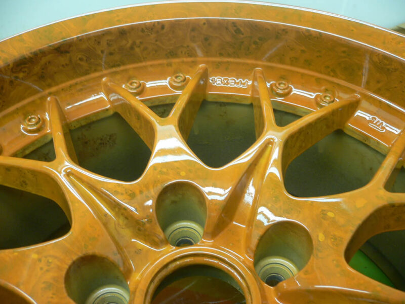 Walnut dipped alloy wheel with orange candy laquer