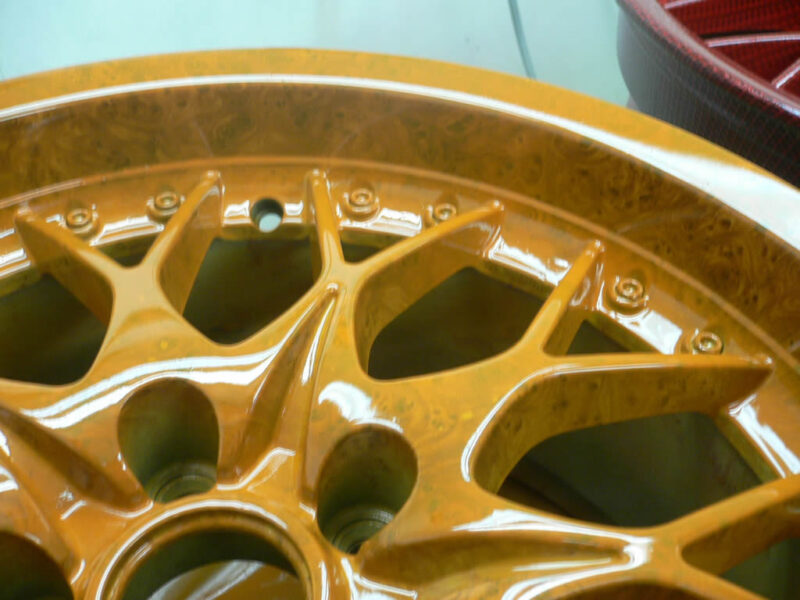 Walnut dipped alloy wheel with orange candy laquer