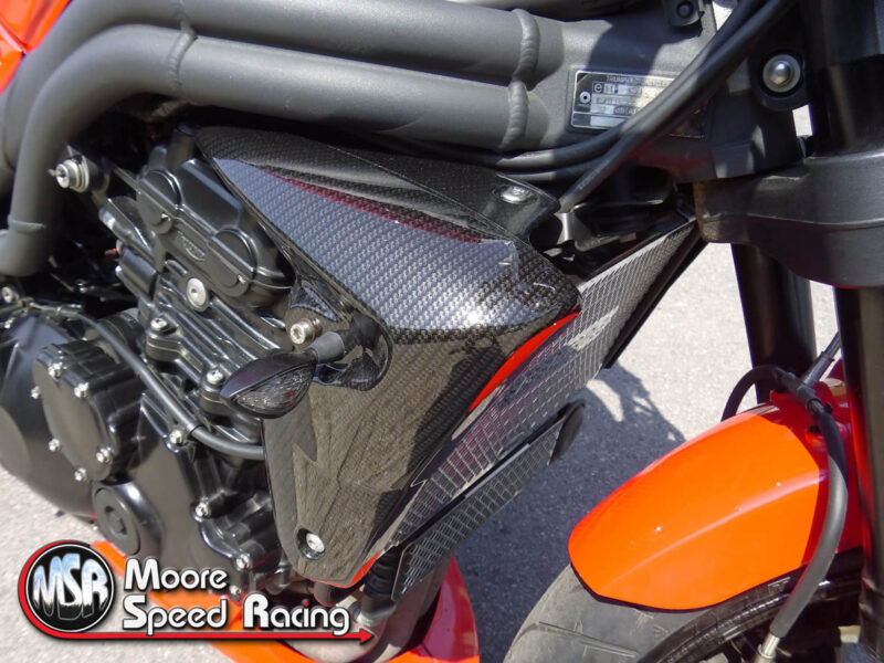 Carbon dipping (water transfer printing) in action on this Triumph Street Triple