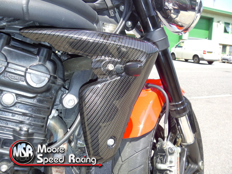 Great view of some carbon dipping (water transfer printing) on a Triumph Street Triple by Hydro dip expert Wicked coatings