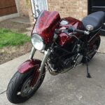 front shot of buell with red skull carbon dipped parts