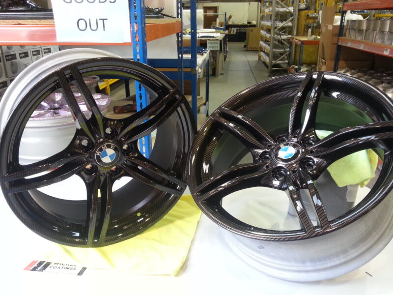 BMW M-Power alloy wheels coated in carbon fibre painted black