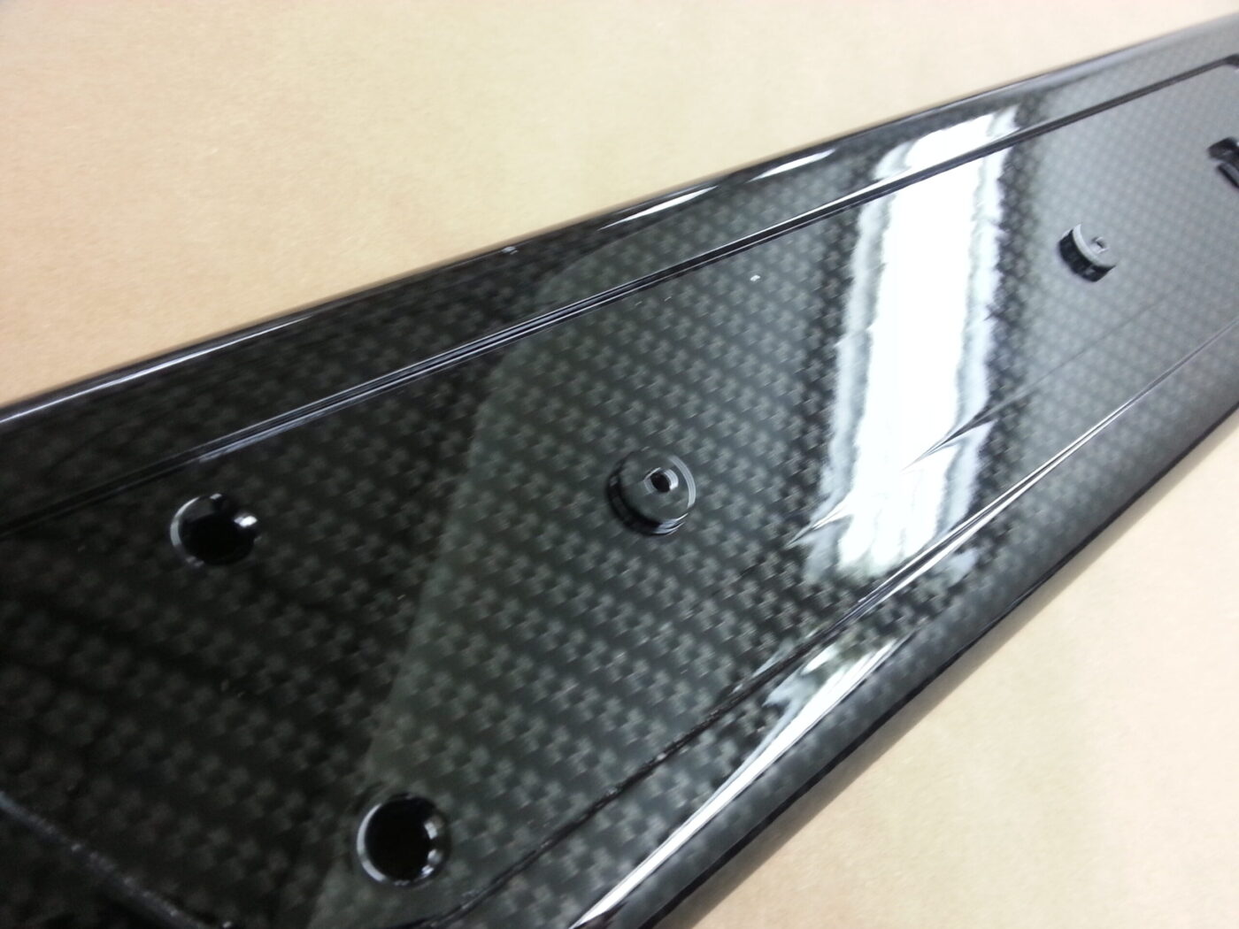 Car interior various parts coated in carbon fibre