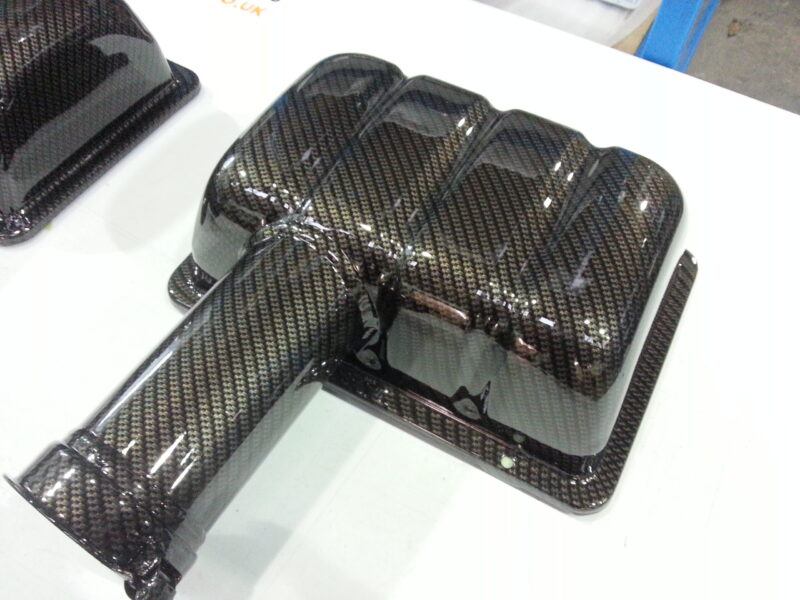 Car Air Filter Case Coated In Carbon Fibre Hydrographic Film Painted Black