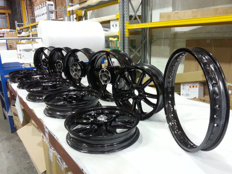 Motorbike wheels coated in carbon fibre