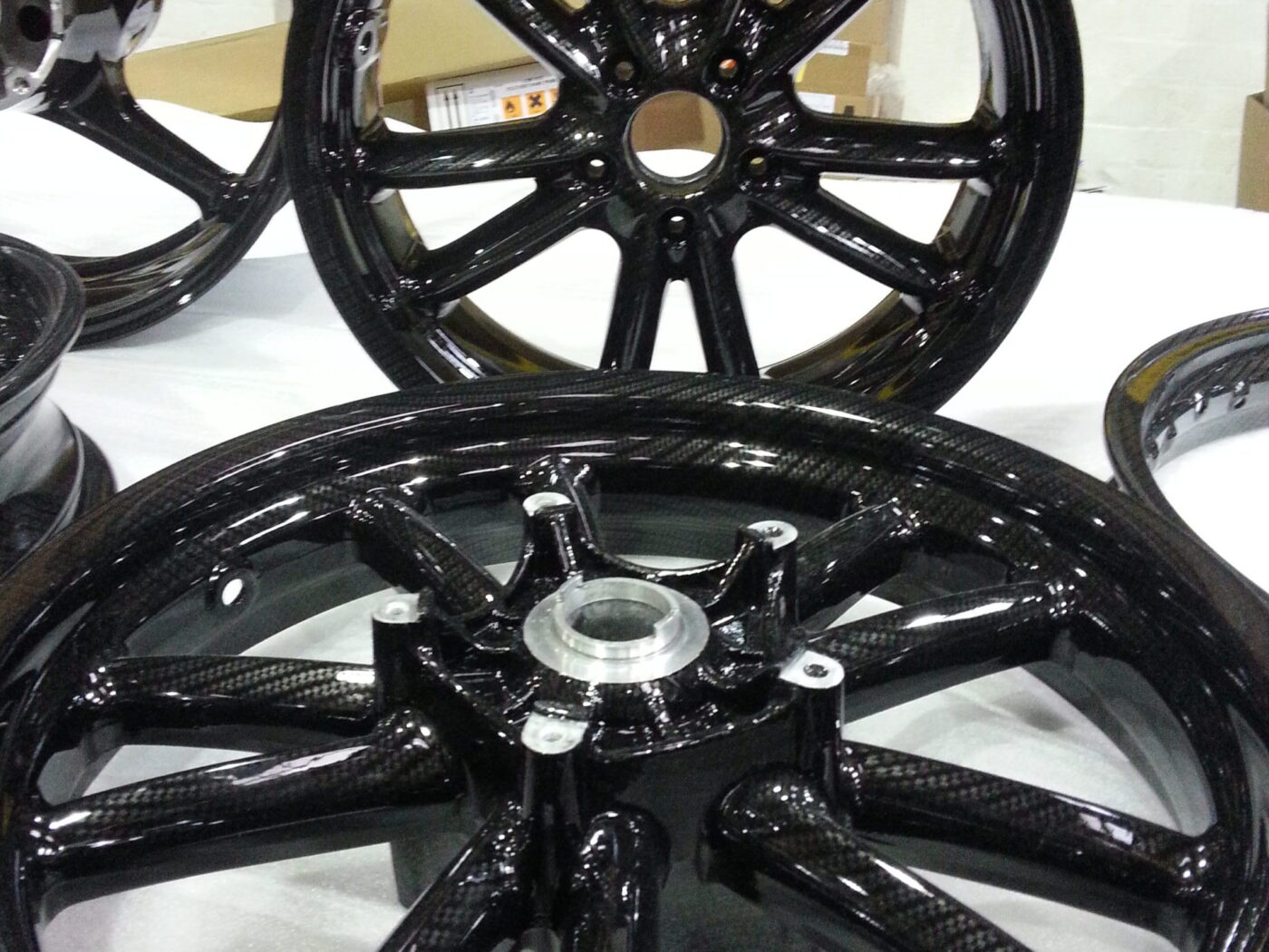 Motorbike wheels coated in carbon fibre