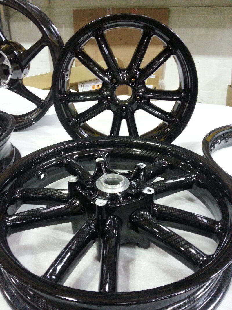 Motorbike wheels coated in carbon fibre
