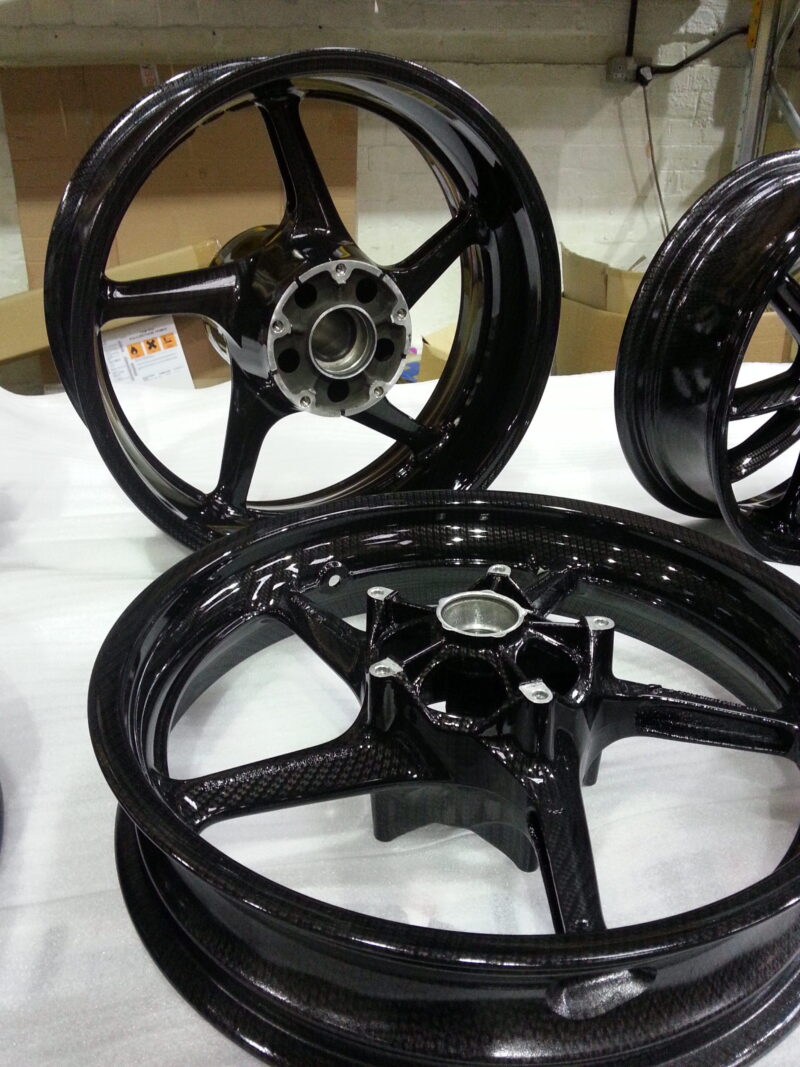 Motorbike wheels coated in carbon fibre