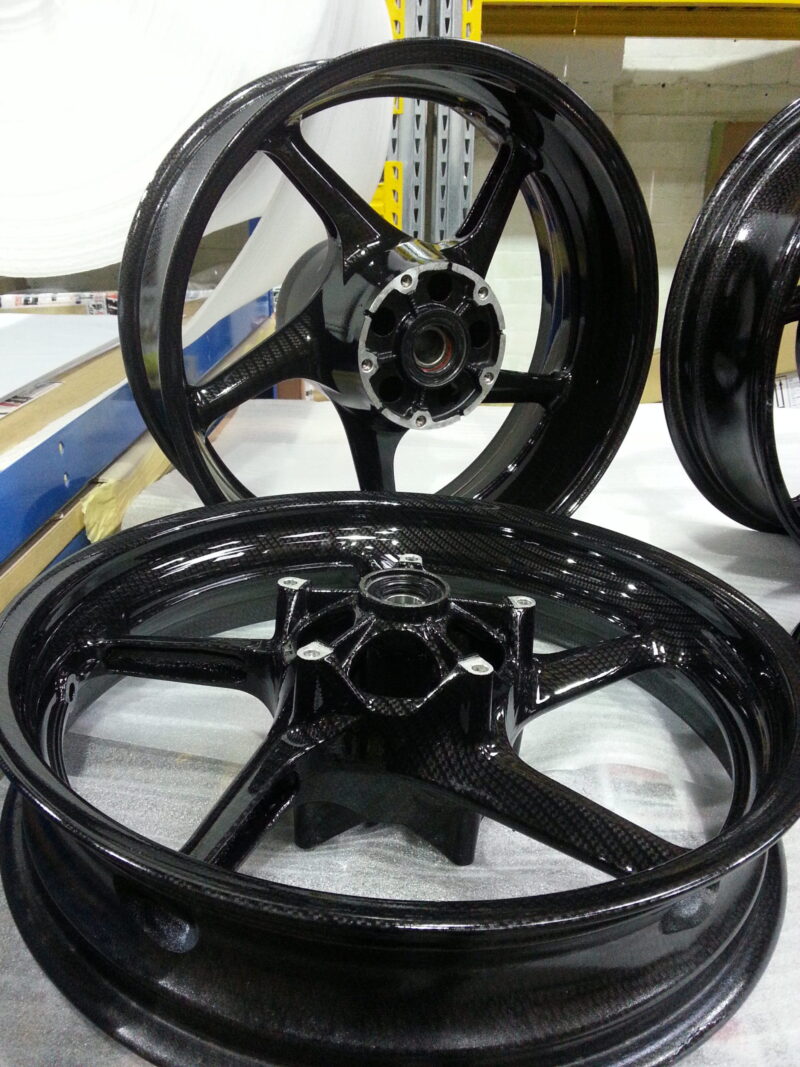 Motorbike wheels coated in carbon fibre