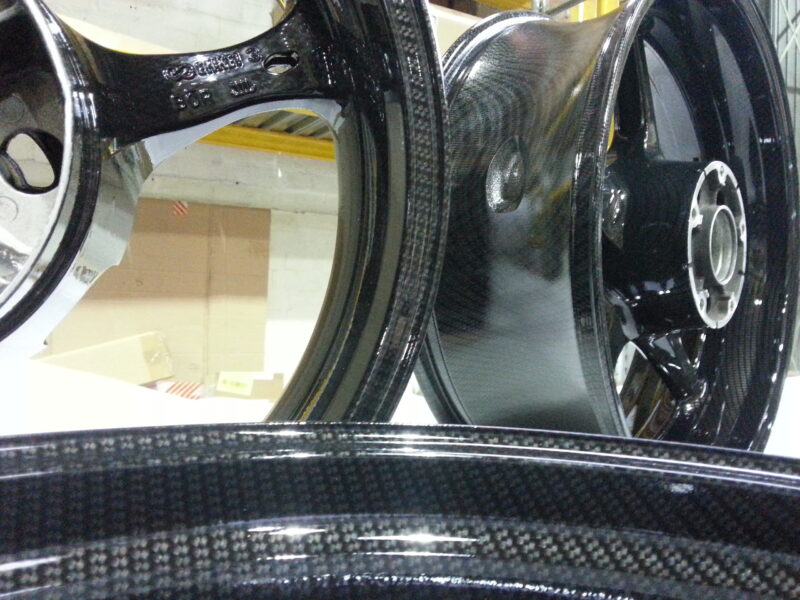 Motorbike wheels coated in carbon fibre