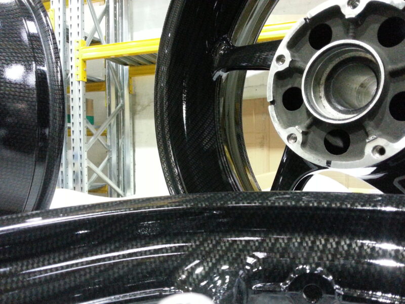 Motorbike wheels coated in carbon fibre