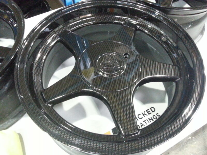 Lotus Alloy Wheels Coated In Carbon Fibre Hydrographic Film Painted Black