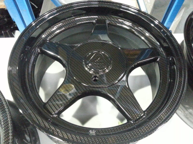 Lotus Alloy Wheels Coated In Carbon Fibre Hydrographic Film Painted Black