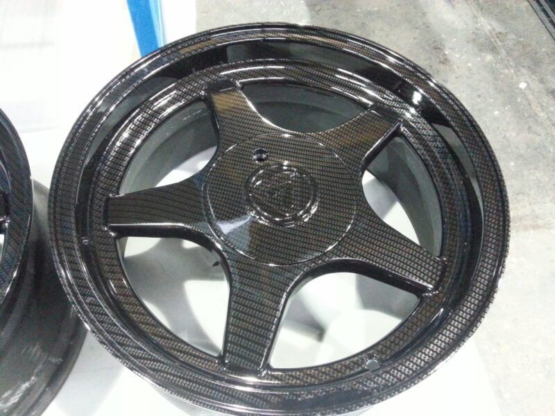 Lotus Alloy Wheels Coated In Carbon Fibre Hydrographic Film Painted Black