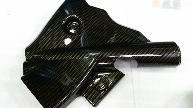 Car interior elements coated in carbon fibre