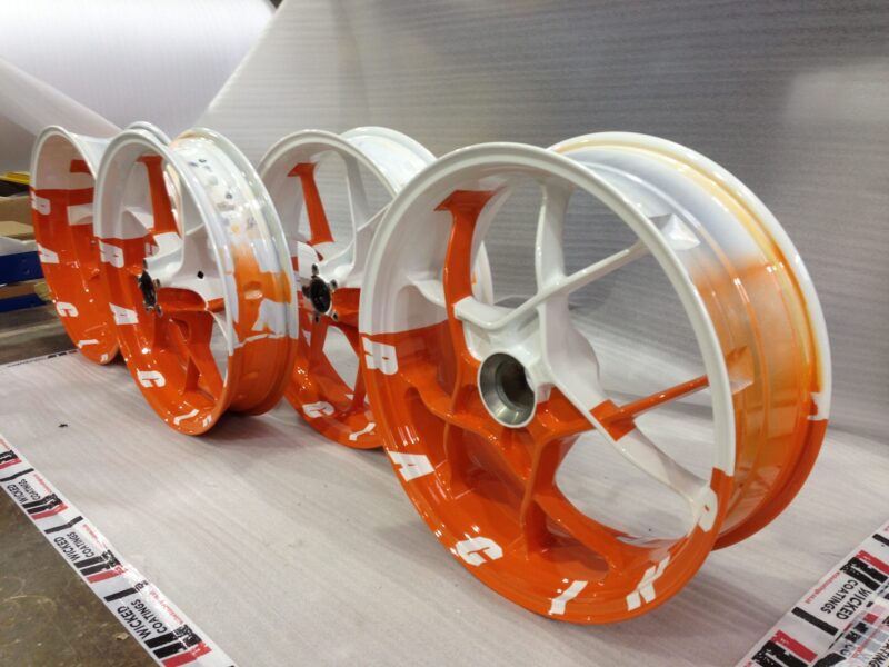 KTM Racing wheels painted white and orange