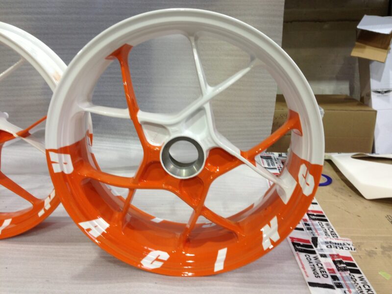 KTM Racing wheels painted white and orange