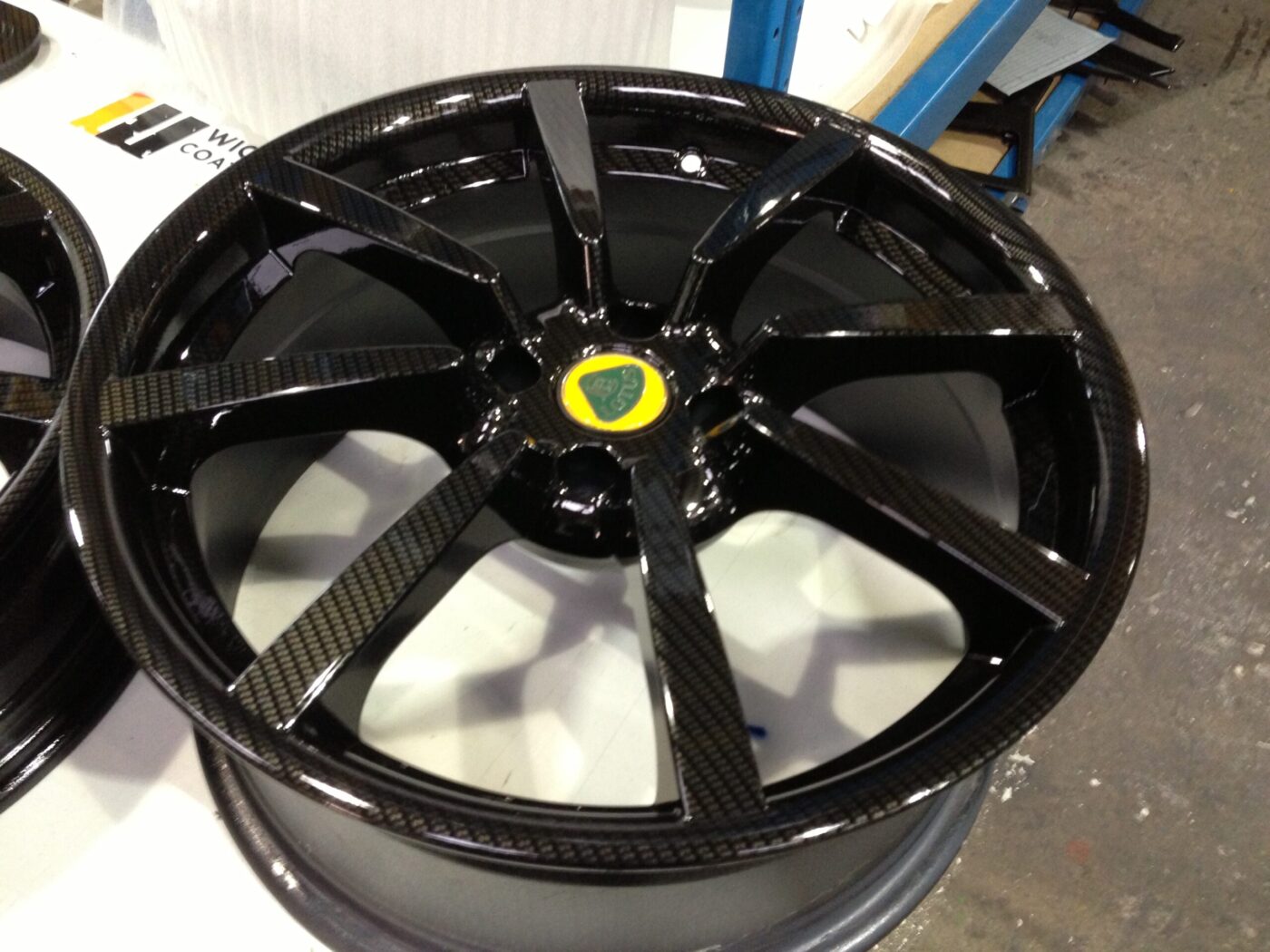 Lotus wheels coated in carbon fibre painted black