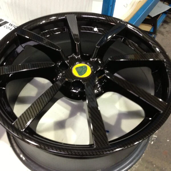 Lotus wheels coated in carbon fibre painted black