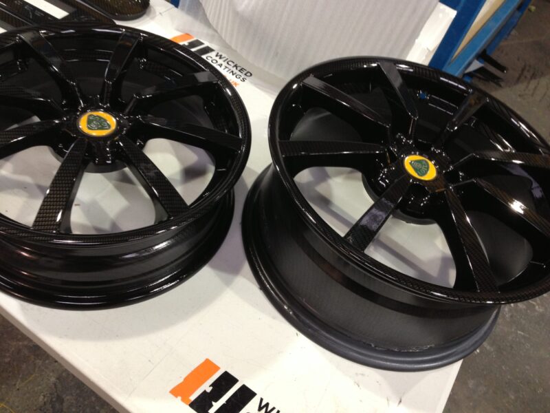 Lotus wheels coated in carbon fibre painted black