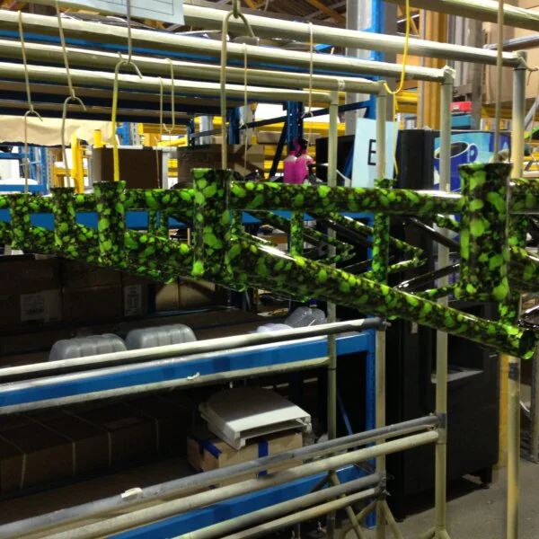 Bike frame coated in skull pattern painted green