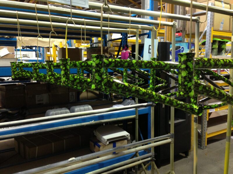 Bike frame coated in skull pattern painted green