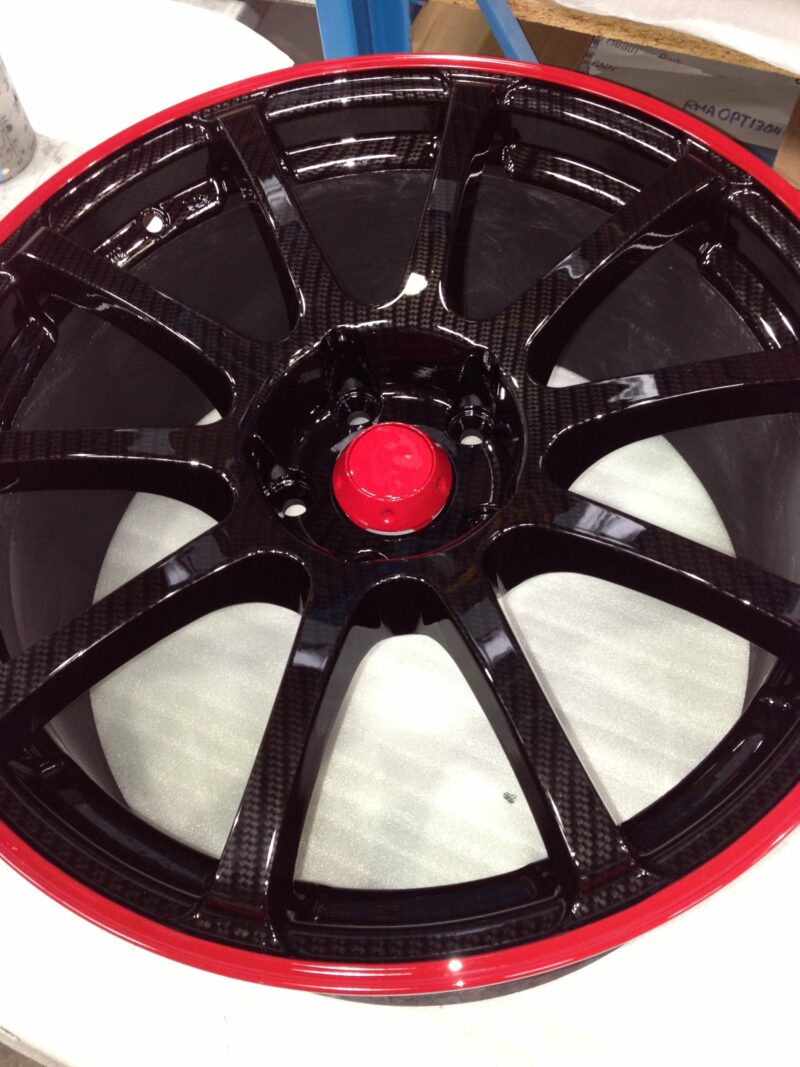 Car Alloy Wheels Coated In Carbon Fibre Painted Black And Red