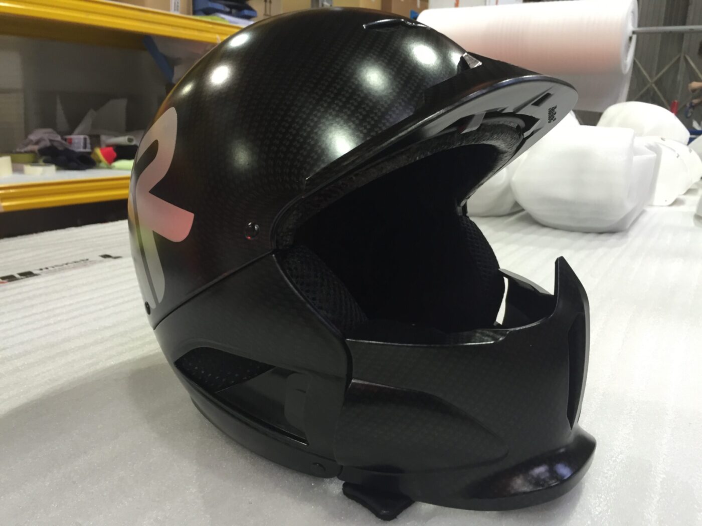 Motorbike Helmets Coated In Carbon Fibre Painted Black
