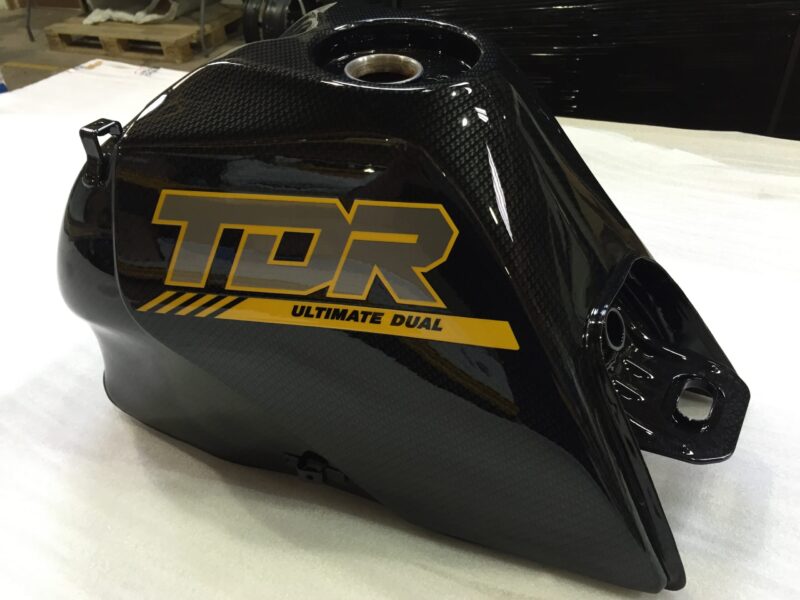 Motorbike tank coated in carbon fibre