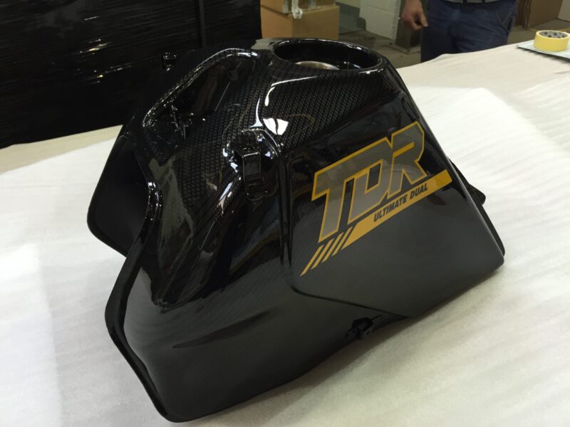 Motorbike tank coated in carbon fibre