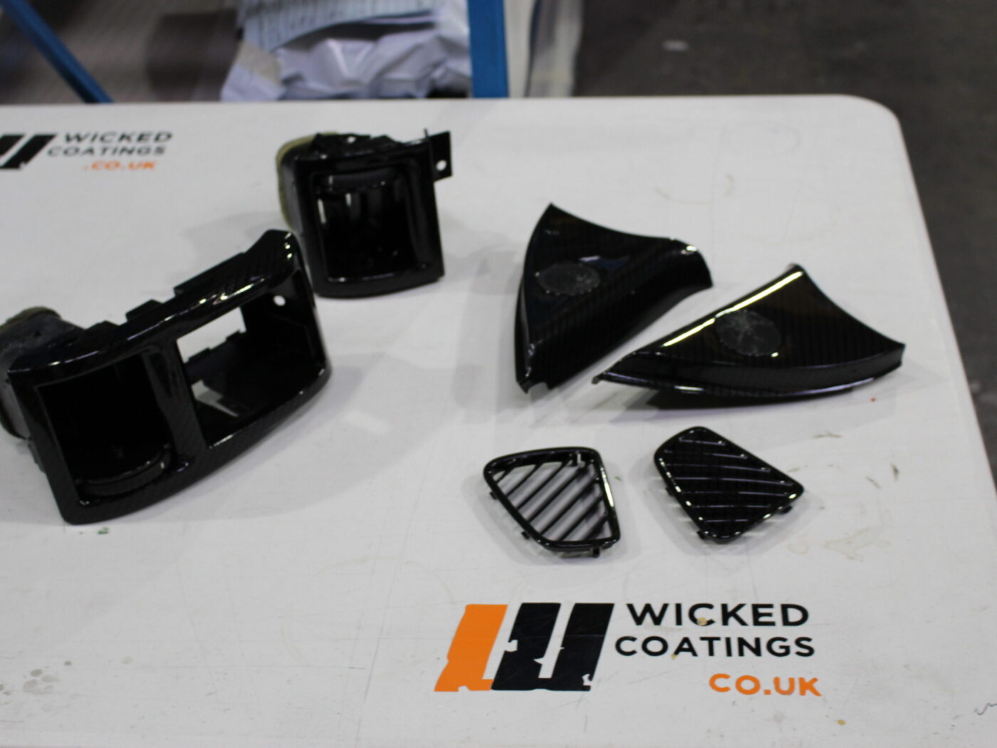 Car interior parts coated in carbon fibre