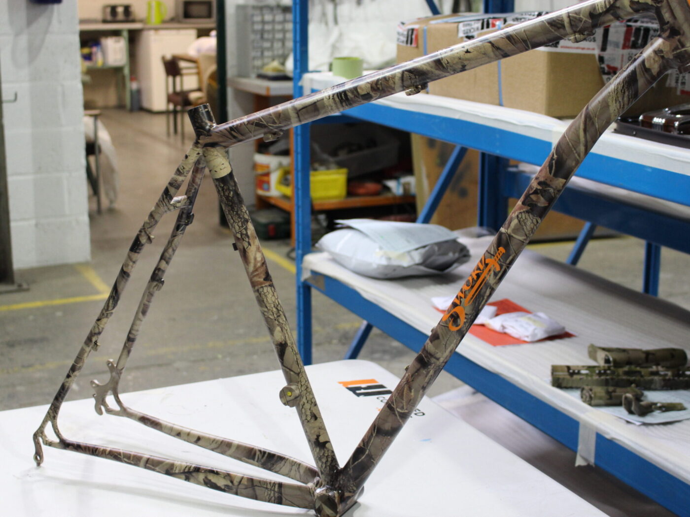 Bike frame coated in camo pattern