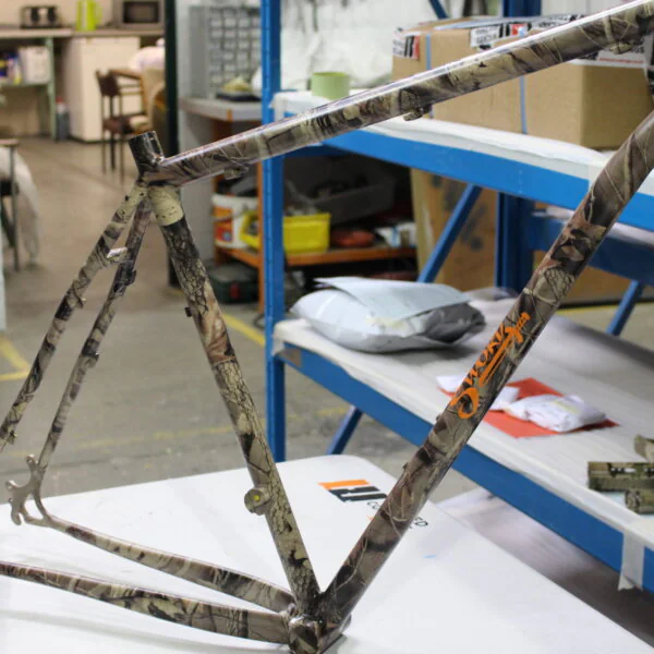 Bike frame coated in camo pattern
