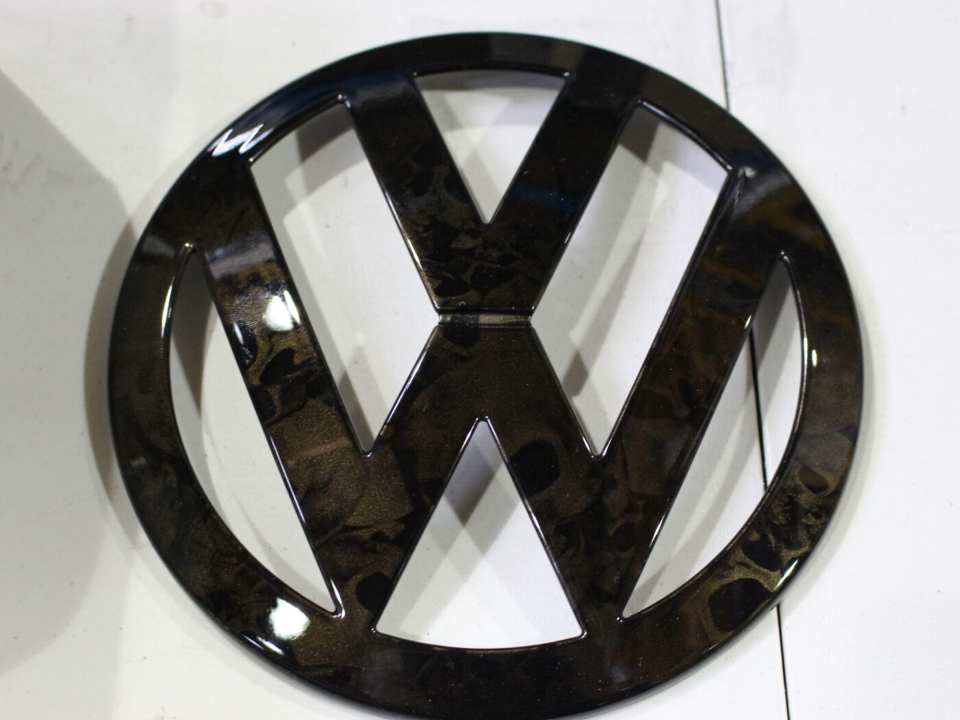VW Multivan badge painted and coated at Wicked Coatings