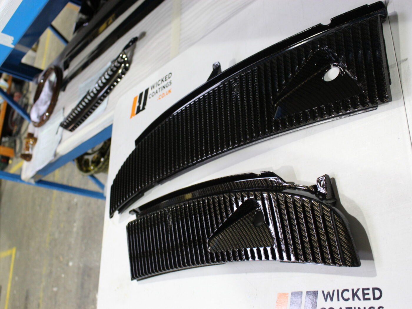 Car exterior coated in carbon fibre
