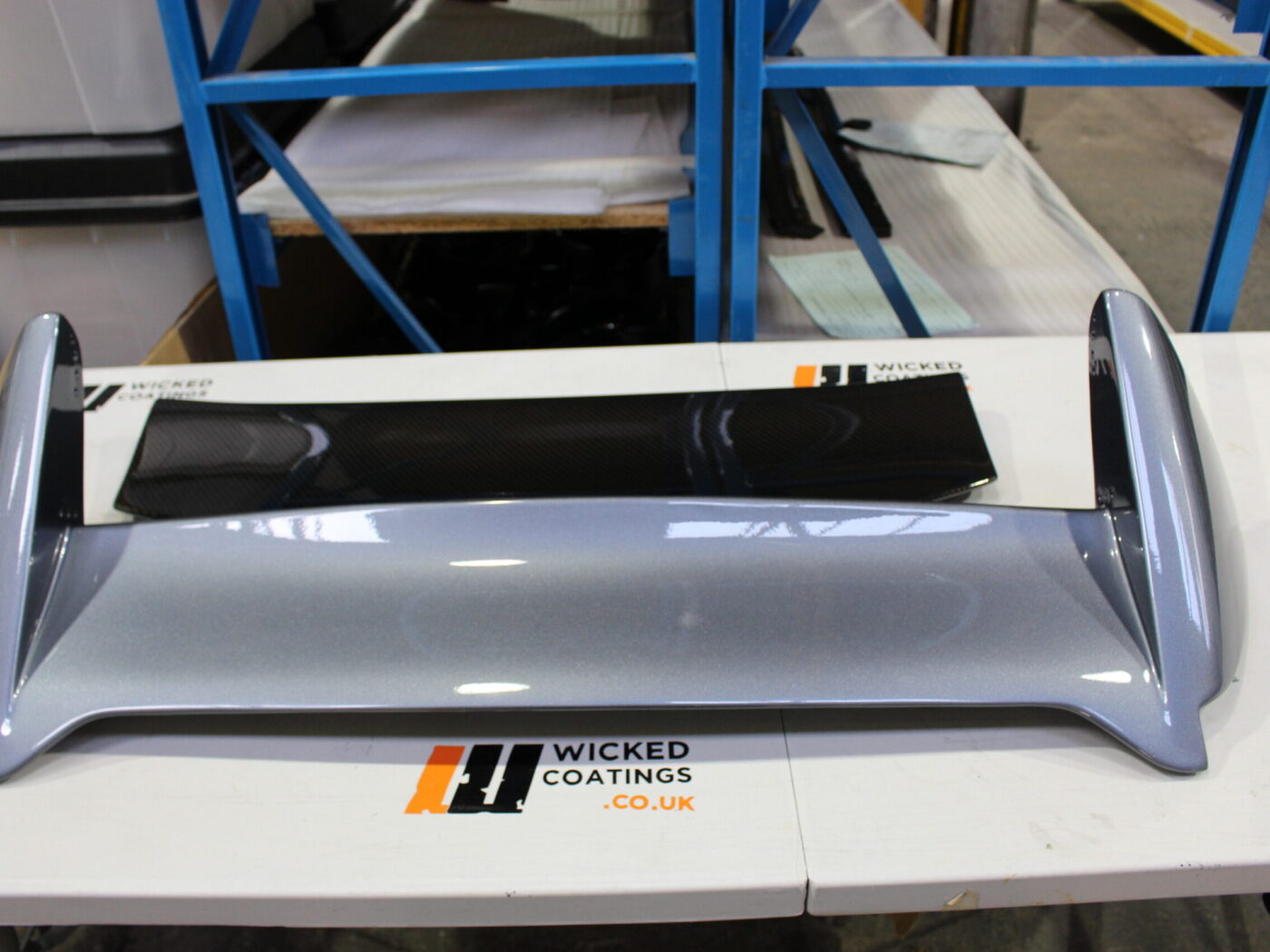 Car exterior parts coated in carbon fibre painted silver